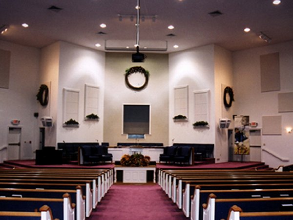 Decoratively disguised acoustical panels improve both sight and sound.