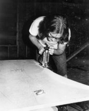 Engineer (Joe Sheets) cutting polycylinder forms.